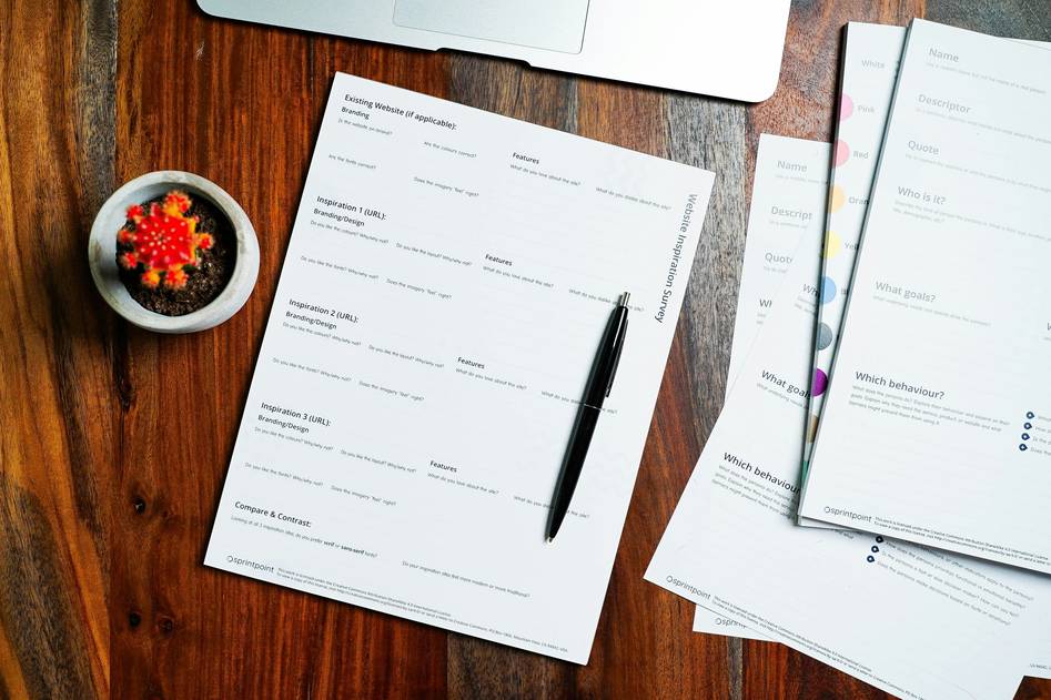 Blog author reviewing convention insurance policies at desk